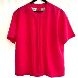 Kathy Lee Neon Pink short sleeve Blouse. Back closure. Pin tuck details. Large